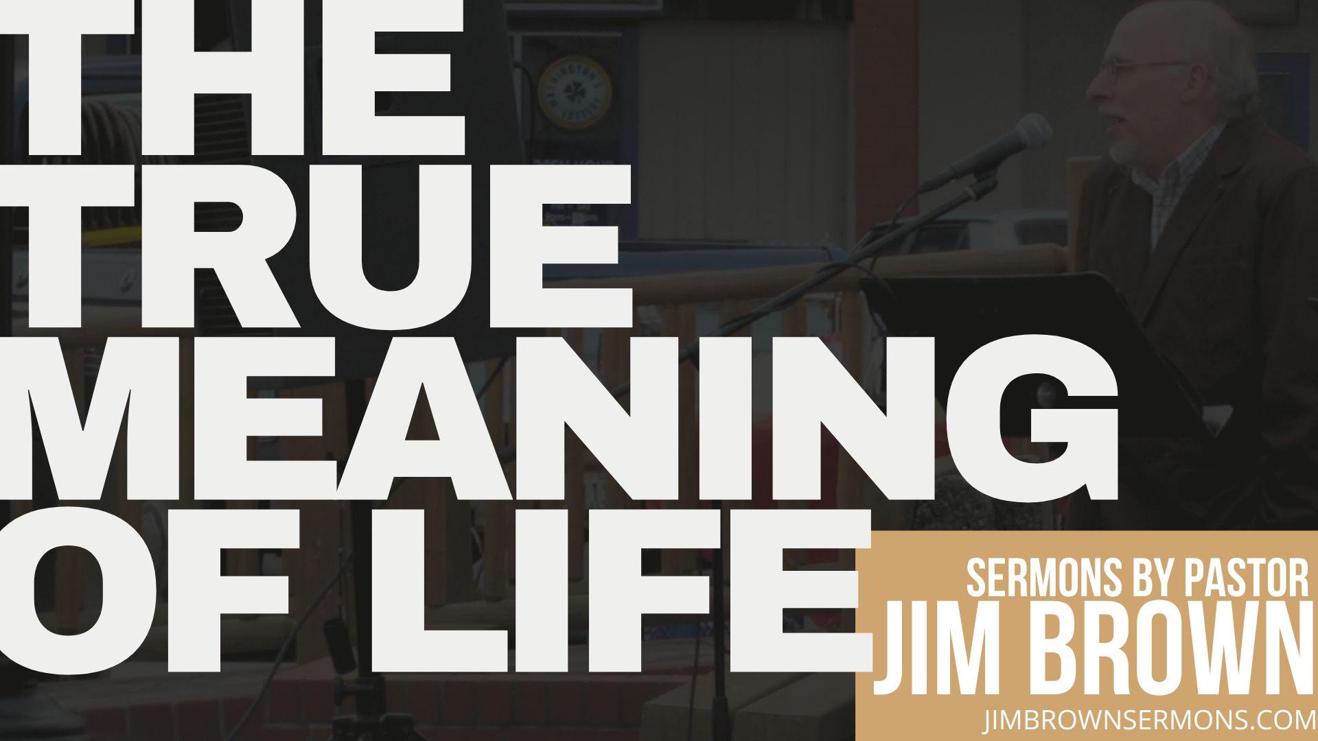 "The True Meaning of Life | The Purpose Of Life from Genesis" sermon slide with a background image of Pastor Jim Brown preaching.
